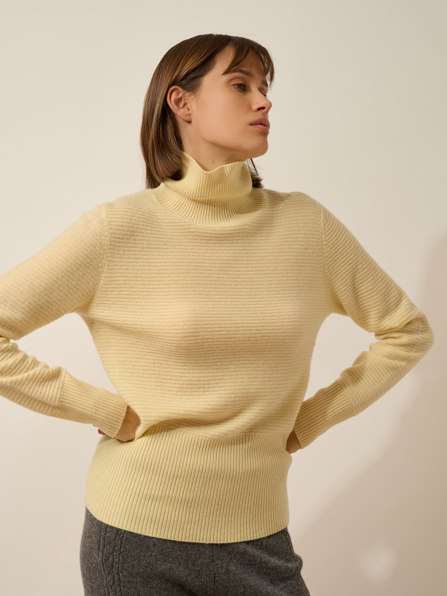 UDNY lemonade turtleneck sweater