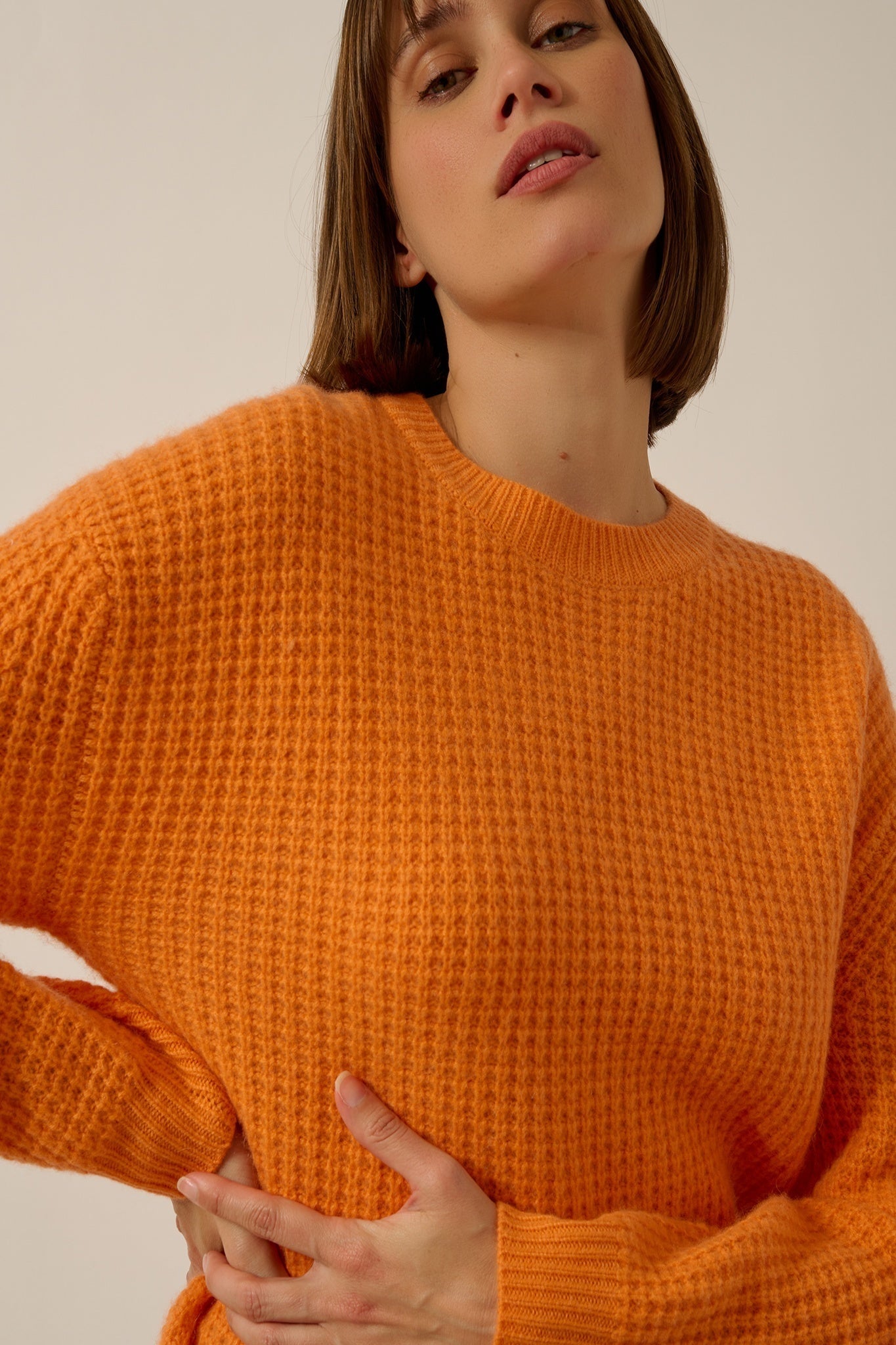 ASSAM 6-ply round neck sweater in melon