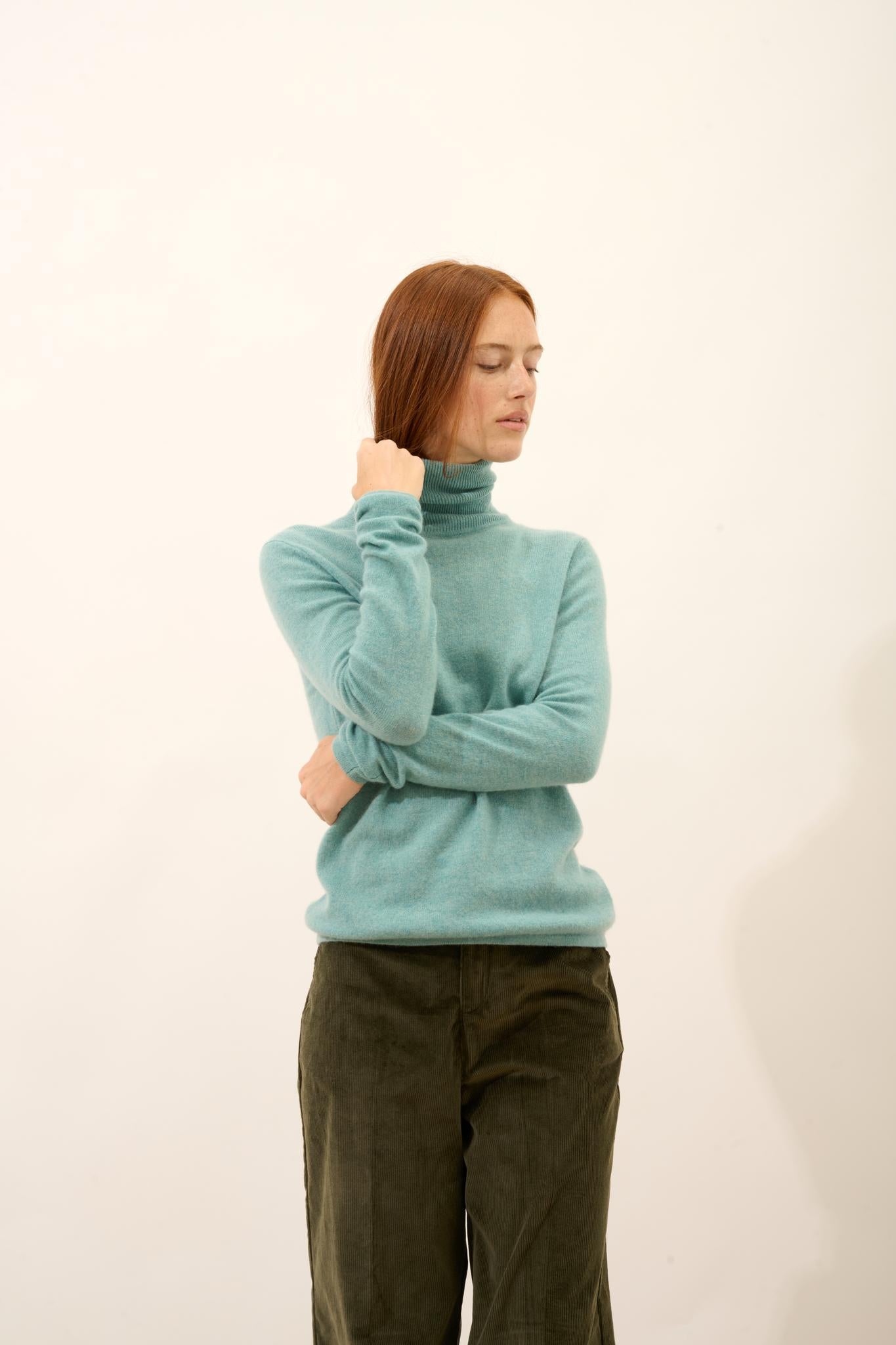 AVA mottled green turtleneck sweater