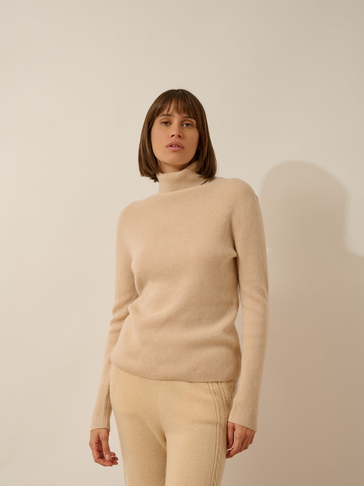 LANAIS sand-colored turtleneck sweater