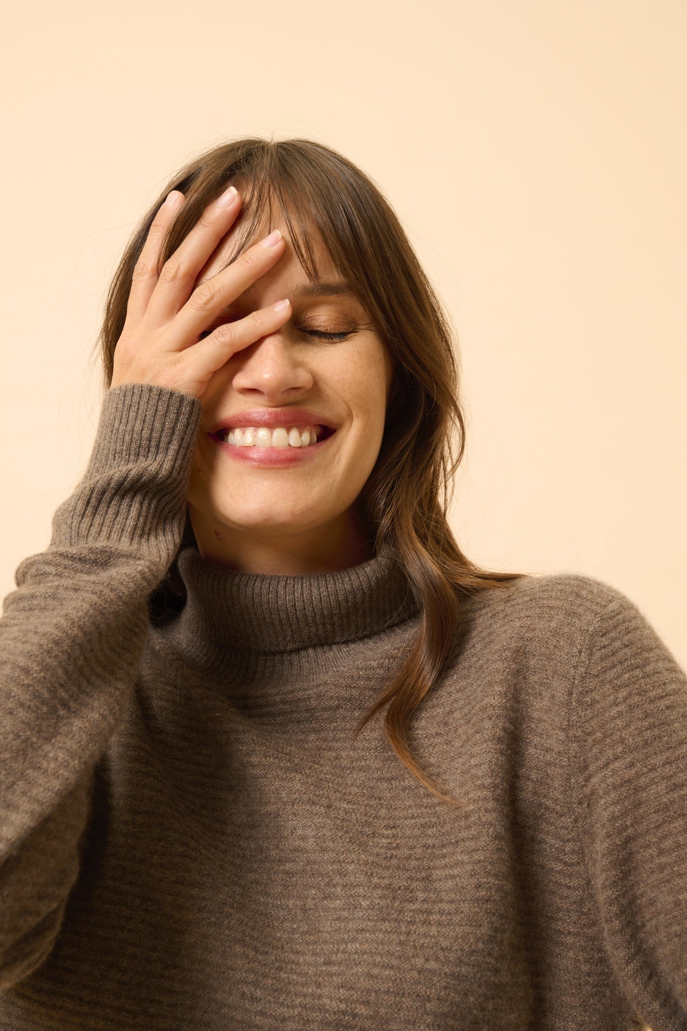 UDNY taupe mottled turtleneck sweater